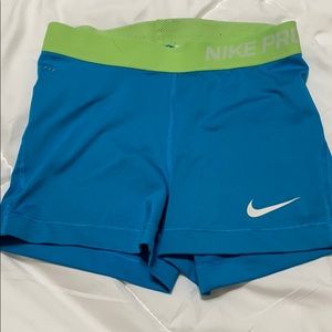 Blue and green Nike pros three inch